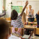 Teacher with students in classroom