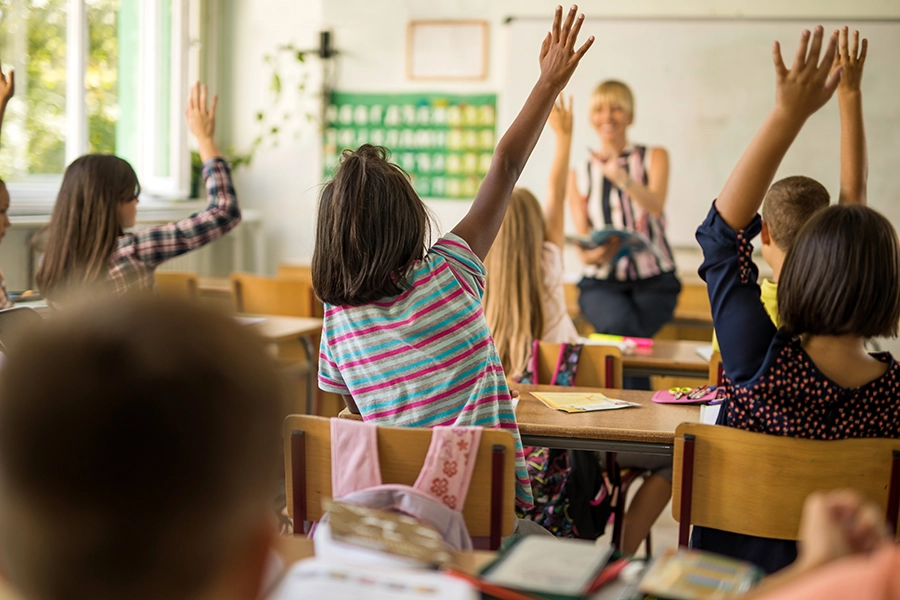 Teacher with students in classroom